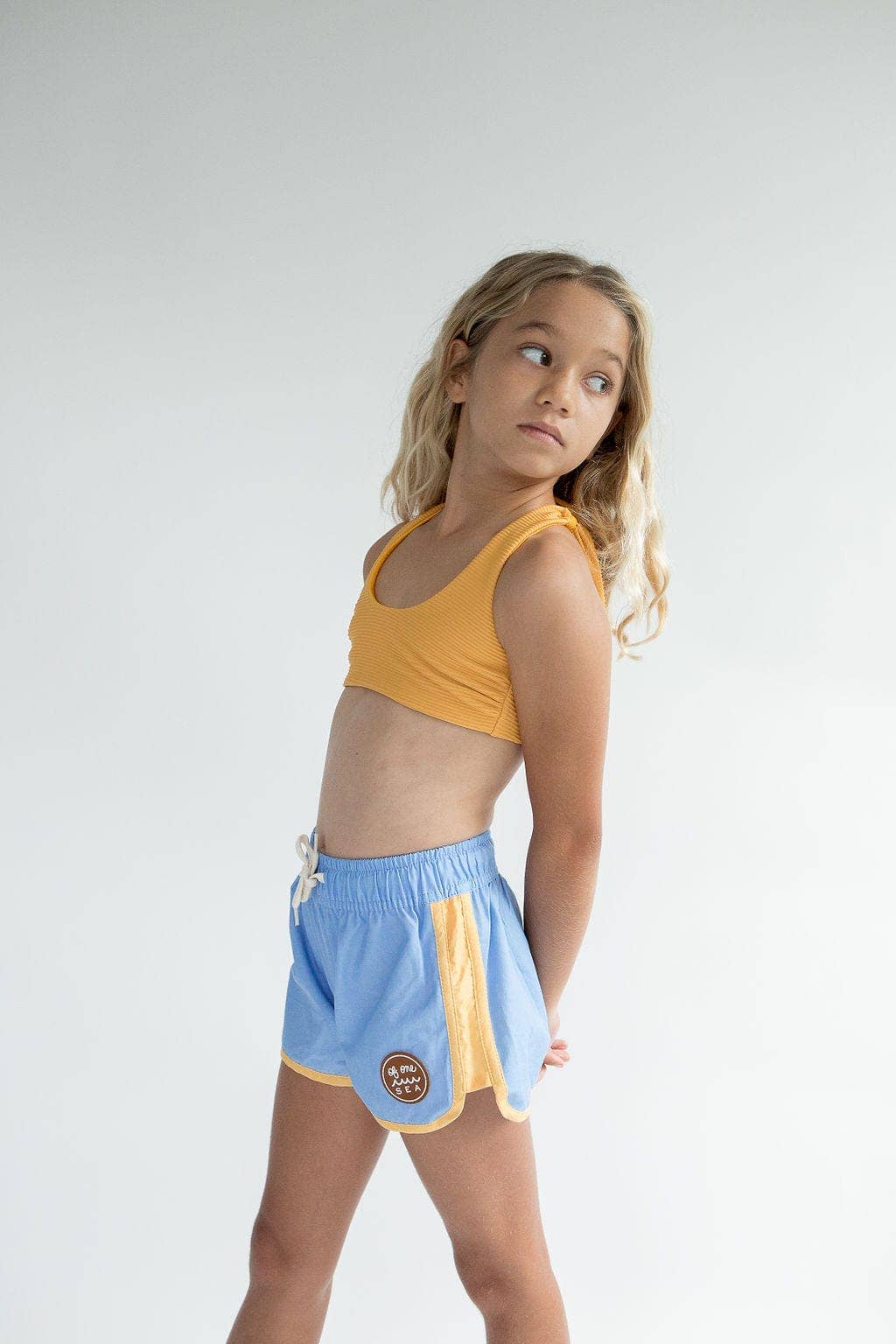 Of One Sea - Kid’s Boardie Watershorts in Light Blue and Yellow Colorblock
