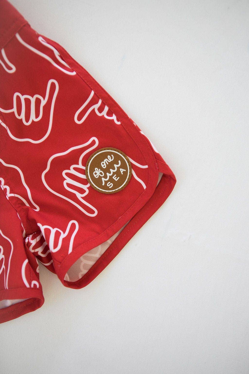 Of One Sea - Kid’s Retro Boardshorts in Red Shaka
