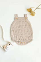 Knitted romper with buttons