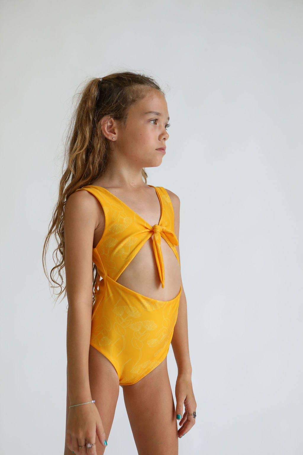 Of One Sea - Girl's Cutout One Piece in Yellow Ohia Lehua Print