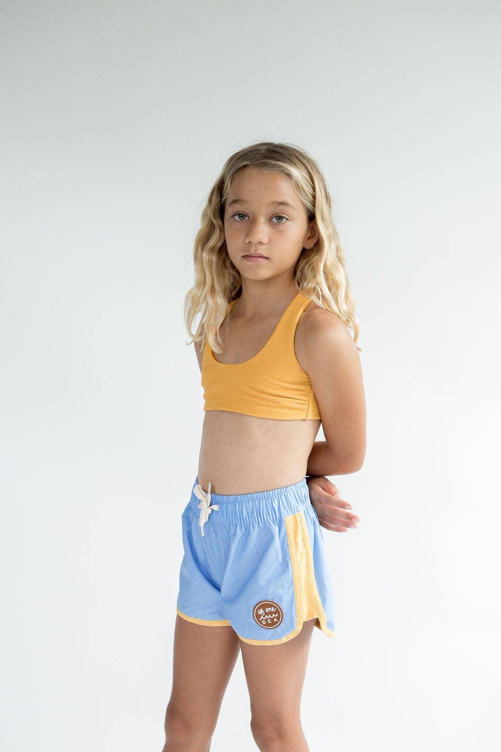 Of One Sea - Kid’s Boardie Watershorts in Light Blue and Yellow Colorblock
