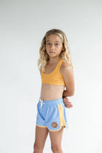 Of One Sea - Kid’s Boardie Watershorts in Light Blue and Yellow Colorblock